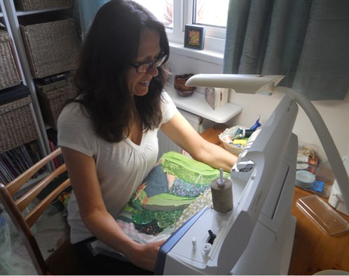 Naomi Renouf working in her sewing room